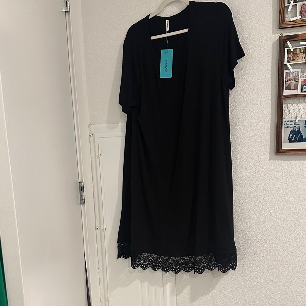 Elegant Black Mini Dress with Lace Detail